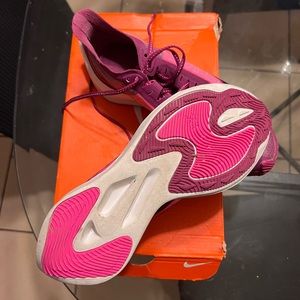 Nike Zoom Gravity shoes, size 8. Pink & purple in color.